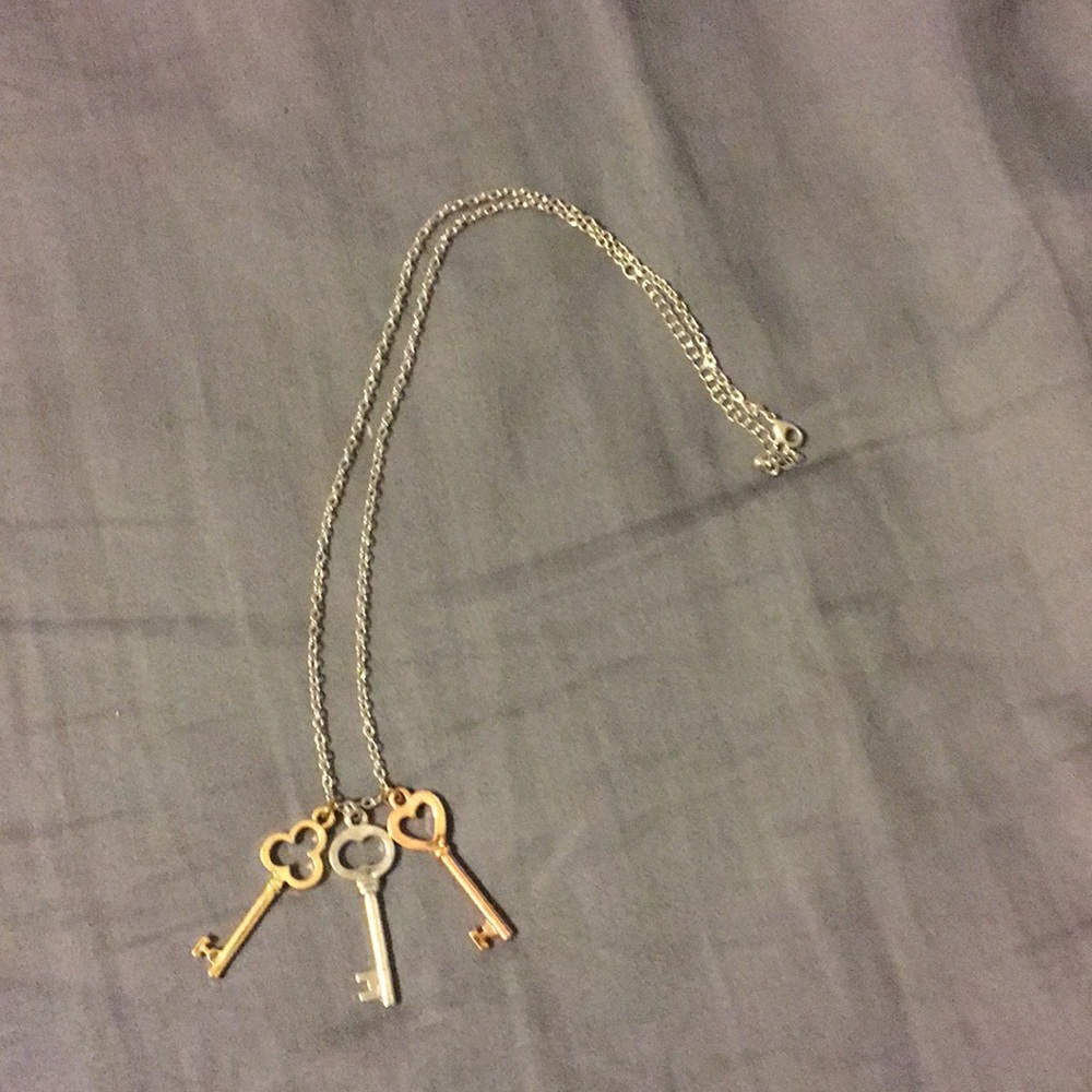 Cute necklace.Keys are gold, silver, and rose gold